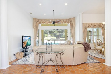 Beautiful three bedroom three bathroom custom home positioned on on Meadowood Golf and Tennis Club in Florida - for sale on GolfHomes.com, golf home, golf lot