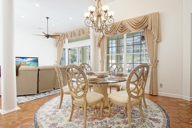 Beautiful three bedroom three bathroom custom home positioned on on Meadowood Golf and Tennis Club in Florida - for sale on GolfHomes.com, golf home, golf lot