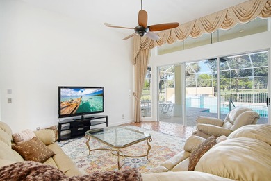 Beautiful three bedroom three bathroom custom home positioned on on Meadowood Golf and Tennis Club in Florida - for sale on GolfHomes.com, golf home, golf lot