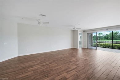 Updated, move-in ready, and immaculately maintained, this on Shadow Wood Preserve in Florida - for sale on GolfHomes.com, golf home, golf lot