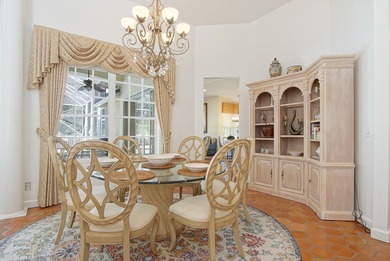 Beautiful three bedroom three bathroom custom home positioned on on Meadowood Golf and Tennis Club in Florida - for sale on GolfHomes.com, golf home, golf lot