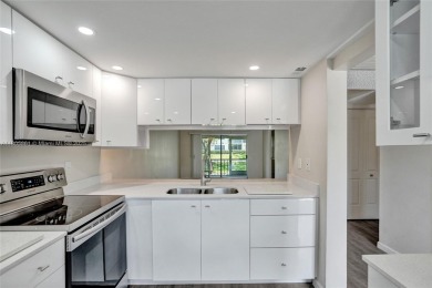Welcome to this beautifully updated 2 bed, 2 bath first-floor on Wynmoor Golf Course in Florida - for sale on GolfHomes.com, golf home, golf lot