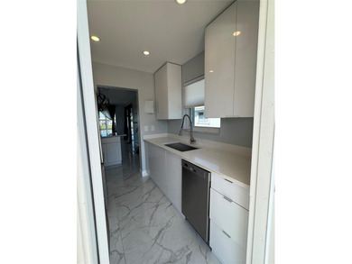 Beautifully Upgraded 2nd floor 2bedroom 2 Bath condo. Corner on Leisureville Community Association in Florida - for sale on GolfHomes.com, golf home, golf lot