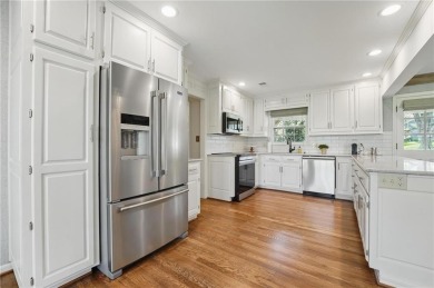 Welcome to 12602 Cherokee Ln, a beautifully updated 1.5-story on Leawood South Country Club in Kansas - for sale on GolfHomes.com, golf home, golf lot