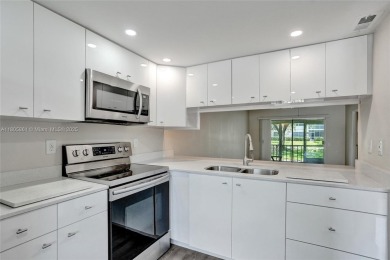 Welcome to this beautifully updated 2 bed, 2 bath first-floor on Wynmoor Golf Course in Florida - for sale on GolfHomes.com, golf home, golf lot