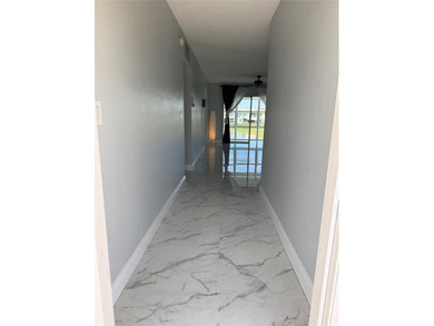 Beautifully Upgraded 2nd floor 2bedroom 2 Bath condo. Corner on Leisureville Community Association in Florida - for sale on GolfHomes.com, golf home, golf lot