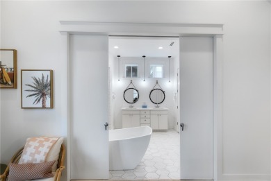 Experience refined coastal living in this stunning 2-bedroom on Palmilla Beach Golf Club in Texas - for sale on GolfHomes.com, golf home, golf lot