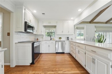 Welcome to 12602 Cherokee Ln, a beautifully updated 1.5-story on Leawood South Country Club in Kansas - for sale on GolfHomes.com, golf home, golf lot