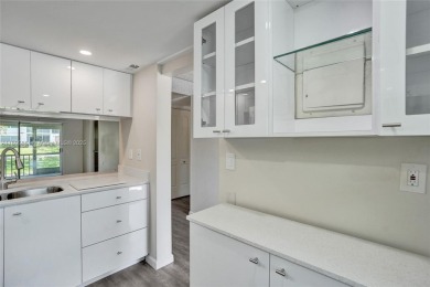 Welcome to this beautifully updated 2 bed, 2 bath first-floor on Wynmoor Golf Course in Florida - for sale on GolfHomes.com, golf home, golf lot
