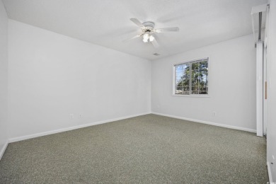 Welcome to this beautiful first-floor, end-unit condo in on The Valley At Eastport in South Carolina - for sale on GolfHomes.com, golf home, golf lot