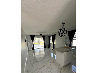 Beautifully Upgraded 2nd floor 2bedroom 2 Bath condo. Corner on Leisureville Community Association in Florida - for sale on GolfHomes.com, golf home, golf lot