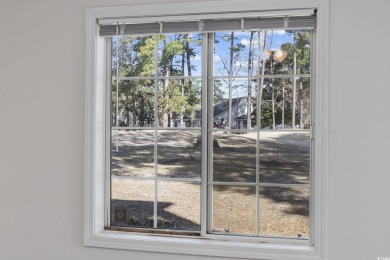 Welcome to this beautiful first-floor, end-unit condo in on The Valley At Eastport in South Carolina - for sale on GolfHomes.com, golf home, golf lot