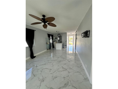 Beautifully Upgraded 2nd floor 2bedroom 2 Bath condo. Corner on Leisureville Community Association in Florida - for sale on GolfHomes.com, golf home, golf lot