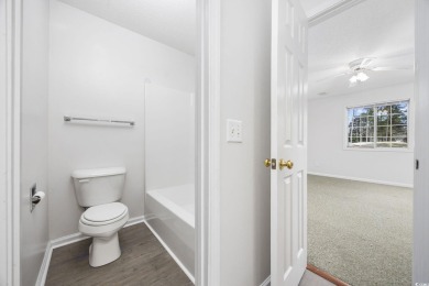 Welcome to this beautiful first-floor, end-unit condo in on The Valley At Eastport in South Carolina - for sale on GolfHomes.com, golf home, golf lot