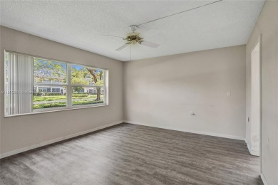 Welcome to this beautifully updated 2 bed, 2 bath first-floor on Wynmoor Golf Course in Florida - for sale on GolfHomes.com, golf home, golf lot
