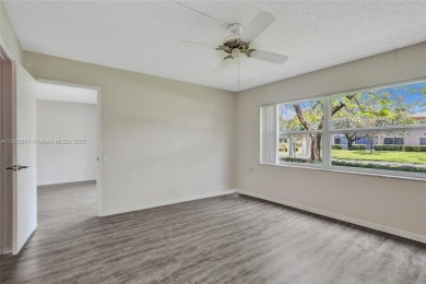 Welcome to this beautifully updated 2 bed, 2 bath first-floor on Wynmoor Golf Course in Florida - for sale on GolfHomes.com, golf home, golf lot
