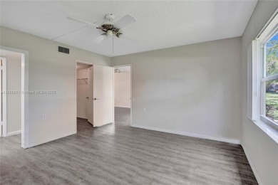 Welcome to this beautifully updated 2 bed, 2 bath first-floor on Wynmoor Golf Course in Florida - for sale on GolfHomes.com, golf home, golf lot