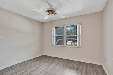 Welcome to this beautifully updated 2 bed, 2 bath first-floor on Wynmoor Golf Course in Florida - for sale on GolfHomes.com, golf home, golf lot