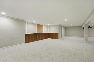 Welcome to 12602 Cherokee Ln, a beautifully updated 1.5-story on Leawood South Country Club in Kansas - for sale on GolfHomes.com, golf home, golf lot