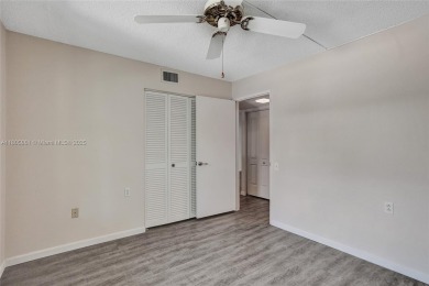 Welcome to this beautifully updated 2 bed, 2 bath first-floor on Wynmoor Golf Course in Florida - for sale on GolfHomes.com, golf home, golf lot