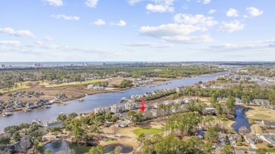 Welcome to this beautiful first-floor, end-unit condo in on The Valley At Eastport in South Carolina - for sale on GolfHomes.com, golf home, golf lot