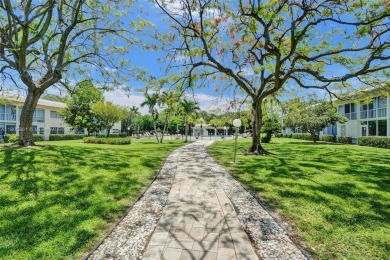 Welcome to this beautifully updated 2 bed, 2 bath first-floor on Wynmoor Golf Course in Florida - for sale on GolfHomes.com, golf home, golf lot