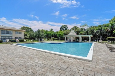 Welcome to this beautifully updated 2 bed, 2 bath first-floor on Wynmoor Golf Course in Florida - for sale on GolfHomes.com, golf home, golf lot