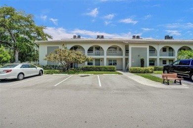 Welcome to this beautifully updated 2 bed, 2 bath first-floor on Wynmoor Golf Course in Florida - for sale on GolfHomes.com, golf home, golf lot