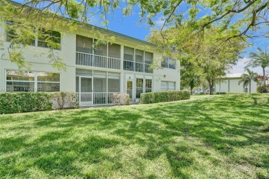 Welcome to this beautifully updated 2 bed, 2 bath first-floor on Wynmoor Golf Course in Florida - for sale on GolfHomes.com, golf home, golf lot