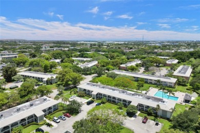 Welcome to this beautifully updated 2 bed, 2 bath first-floor on Wynmoor Golf Course in Florida - for sale on GolfHomes.com, golf home, golf lot