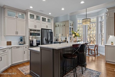 This gorgeous golf front home sits on two lots in a peaceful on Pinewild Country Club of Pinehurst in North Carolina - for sale on GolfHomes.com, golf home, golf lot