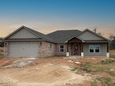 This incredible 4 bed, 2 bath home features an open kitchen on White Bluff Resort - Old Course in Texas - for sale on GolfHomes.com, golf home, golf lot