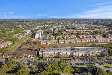 ABSOLUTELY GORGEOUS WATERFRONT 4TH FLOOR CONDO | PRESTIGIOUS 55+ on Fountains Golf and Country Club in Florida - for sale on GolfHomes.com, golf home, golf lot
