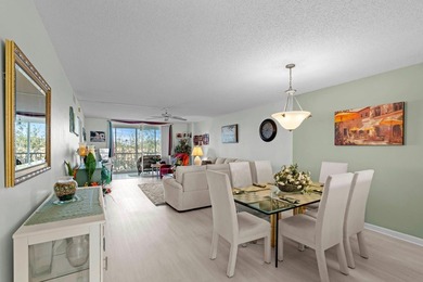 ABSOLUTELY GORGEOUS WATERFRONT 4TH FLOOR CONDO | PRESTIGIOUS 55+ on Fountains Golf and Country Club in Florida - for sale on GolfHomes.com, golf home, golf lot