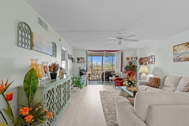 ABSOLUTELY GORGEOUS WATERFRONT 4TH FLOOR CONDO | PRESTIGIOUS 55+ on Fountains Golf and Country Club in Florida - for sale on GolfHomes.com, golf home, golf lot