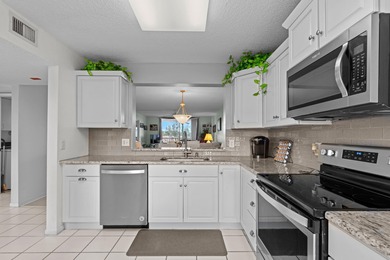 ABSOLUTELY GORGEOUS WATERFRONT 4TH FLOOR CONDO | PRESTIGIOUS 55+ on Fountains Golf and Country Club in Florida - for sale on GolfHomes.com, golf home, golf lot