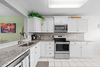 ABSOLUTELY GORGEOUS WATERFRONT 4TH FLOOR CONDO | PRESTIGIOUS 55+ on Fountains Golf and Country Club in Florida - for sale on GolfHomes.com, golf home, golf lot