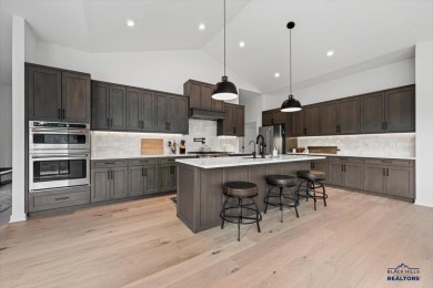 Welcome to a custom-designed ranch home offering approximately 3 on  in South Dakota - for sale on GolfHomes.com, golf home, golf lot