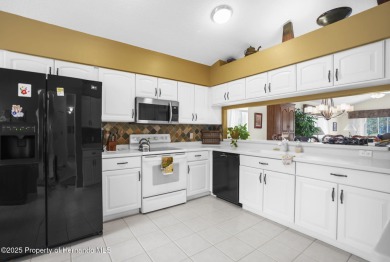 FANTASTIC MOVE IN READY HOME with OUTSTANDING VIEW OF THE GOLF on Heritage Pines Country Club in Florida - for sale on GolfHomes.com, golf home, golf lot