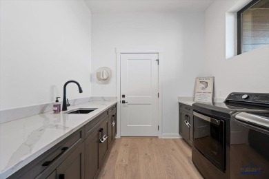 Welcome to a custom-designed ranch home offering approximately 3 on  in South Dakota - for sale on GolfHomes.com, golf home, golf lot