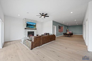 Welcome to a custom-designed ranch home offering approximately 3 on  in South Dakota - for sale on GolfHomes.com, golf home, golf lot