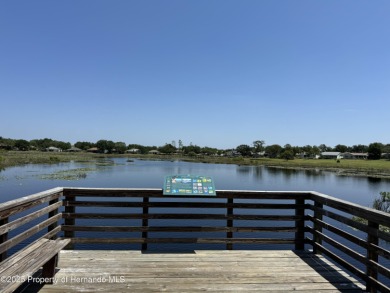 FANTASTIC MOVE IN READY HOME with OUTSTANDING VIEW OF THE GOLF on Heritage Pines Country Club in Florida - for sale on GolfHomes.com, golf home, golf lot