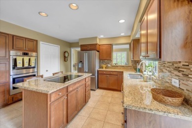 End-Unit Luxury with Golf Views, Abundant Light & Private Gate on Lake Barrington Shores Golf Course in Illinois - for sale on GolfHomes.com, golf home, golf lot