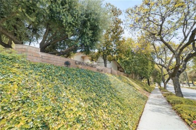 Welcome to this beautifully designed tri-level condo in the on Canyon Crest Country Club in California - for sale on GolfHomes.com, golf home, golf lot