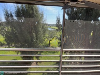 BEAUTIFUL AND CHARMING 2/2 APARTMENT ON THE TOP FLOOR WITH A on Davie Golf Club in Florida - for sale on GolfHomes.com, golf home, golf lot