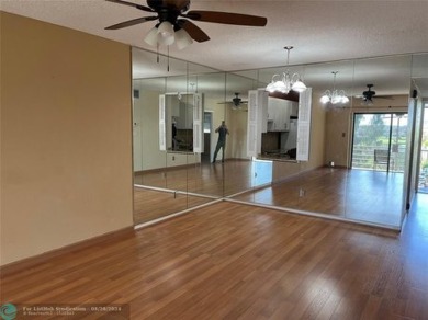 BEAUTIFUL AND CHARMING 2/2 APARTMENT ON THE TOP FLOOR WITH A on Davie Golf Club in Florida - for sale on GolfHomes.com, golf home, golf lot