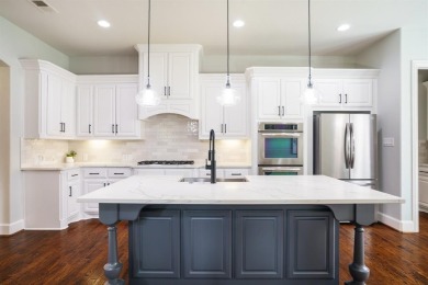 Situated on a beautifully elevated lot with mature trees and on The Golf Club At Twin Creeks in Texas - for sale on GolfHomes.com, golf home, golf lot