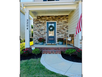 Welcome to 3204 Carnoustie, an elegant residence located in the on Gates Four Golf and Country Club in North Carolina - for sale on GolfHomes.com, golf home, golf lot