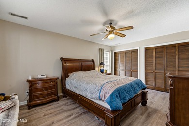 This home is situated on an expansive 3/4-acre homesite in one on Carolina Shores Golf Course in North Carolina - for sale on GolfHomes.com, golf home, golf lot