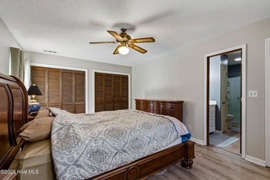 This home is situated on an expansive 3/4-acre homesite in one on Carolina Shores Golf Course in North Carolina - for sale on GolfHomes.com, golf home, golf lot